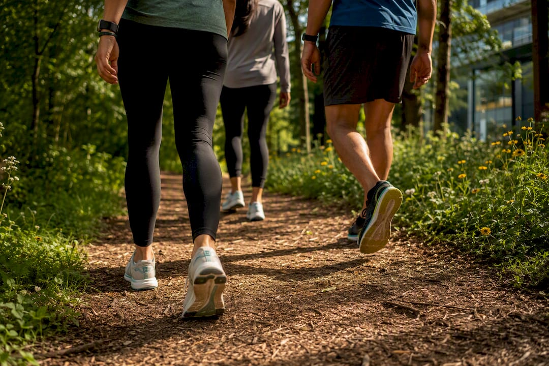 Walking meeting participants on outdoor trail